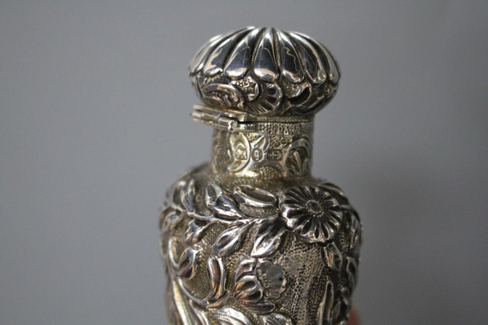 A Late Victorian silver mounted perfume bottle, in Goldsmith & Silversmith box, by Horton and Allday, Birmingham 1890